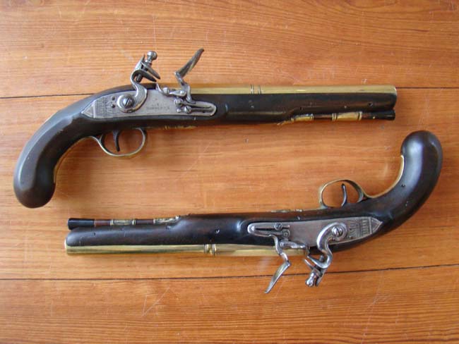 A pair of English flintlock brass barreled coaching pistols by John Bennett circa 1790 — image 3